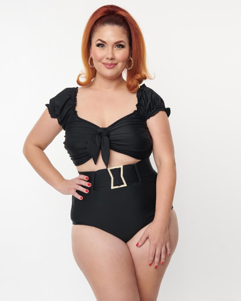 Front of a model wearing a size L Unique Vintage Black Shirred Bow Bandeau Swim Top in Black by Unique Vintage. | dia_product_style_image_id:289330
